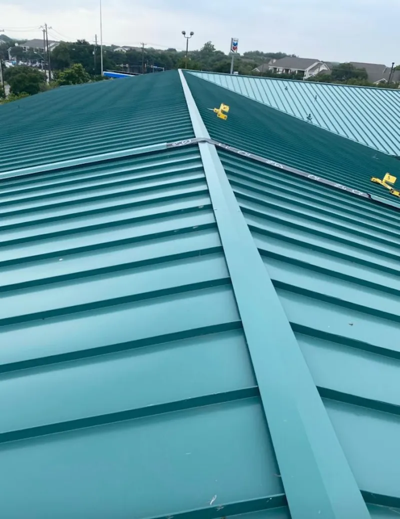 Green commercial metal roof ridge and valley for Metal Roof Repair in Westville